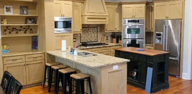 Open kitchen with an island, before painting
