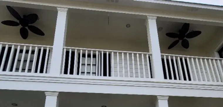 Balcony railing and porch ceiling, after painting