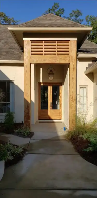 Double wooden entry doors, restained, before painting